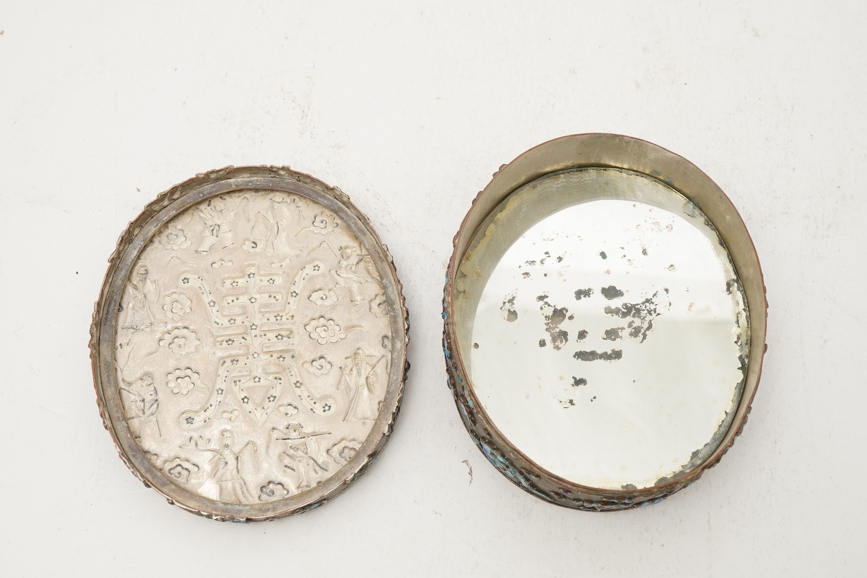 A Chinese silver plated and enamel ‘eight immortals’ oval box, late 19th century